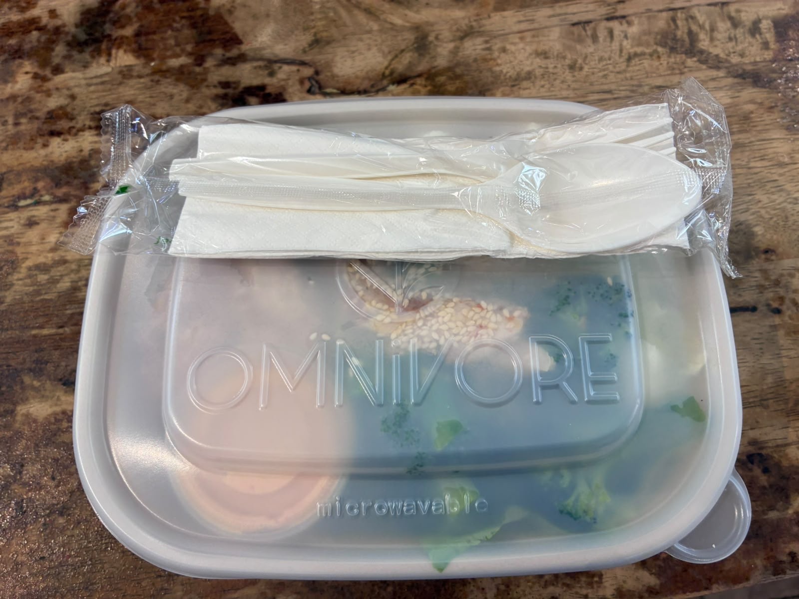 Takeaway bowl with lid and cutlery from Omnivore at The Basement Singapore