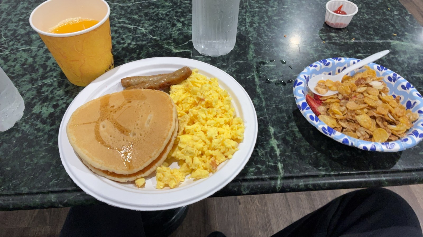 Buffet breakfast of pancakes, scrambled eggs and sausage at Azure Hotel and Suites in Ontario, California