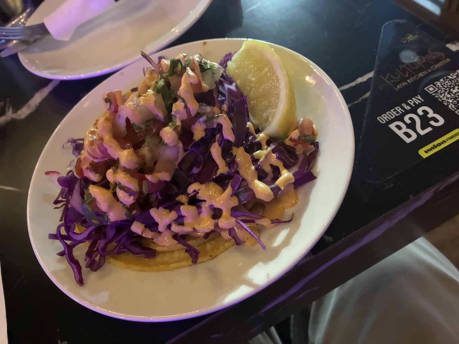 Shrimp tacos with red cabbage and chipotle crema at Kulturas Latin Kitchen and Cantina, Ontario, California