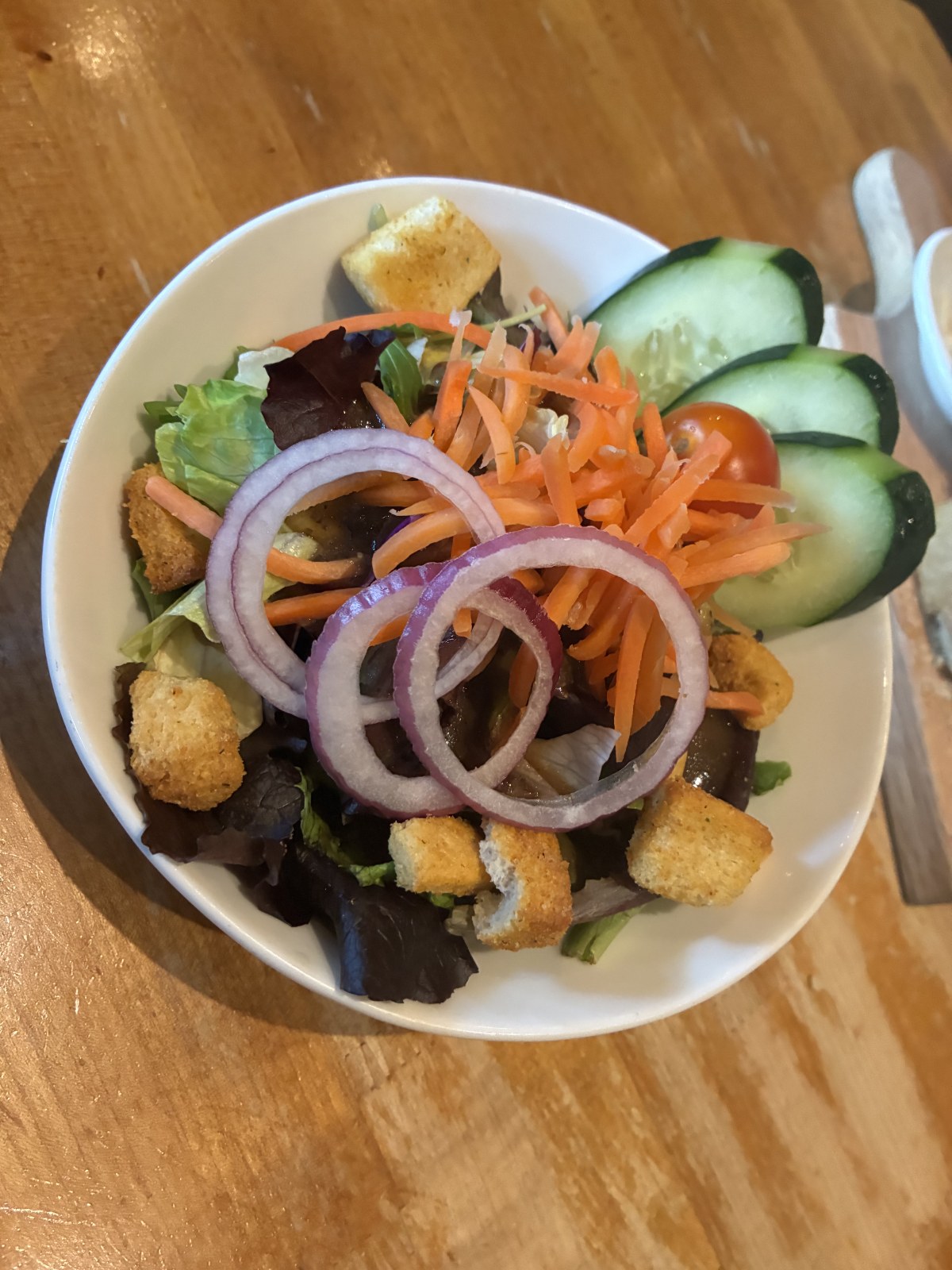 House salad with croutons, cucumber and red onion at Market Broiler, Ontario Mills