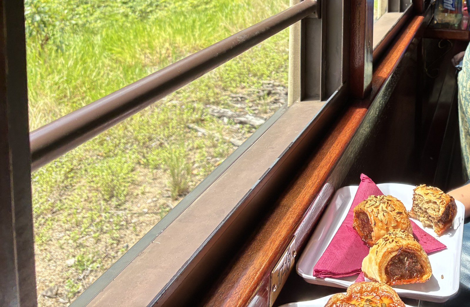 Sausage rolls served in the Gold Class carriage of the Kuranda Scenic Railway