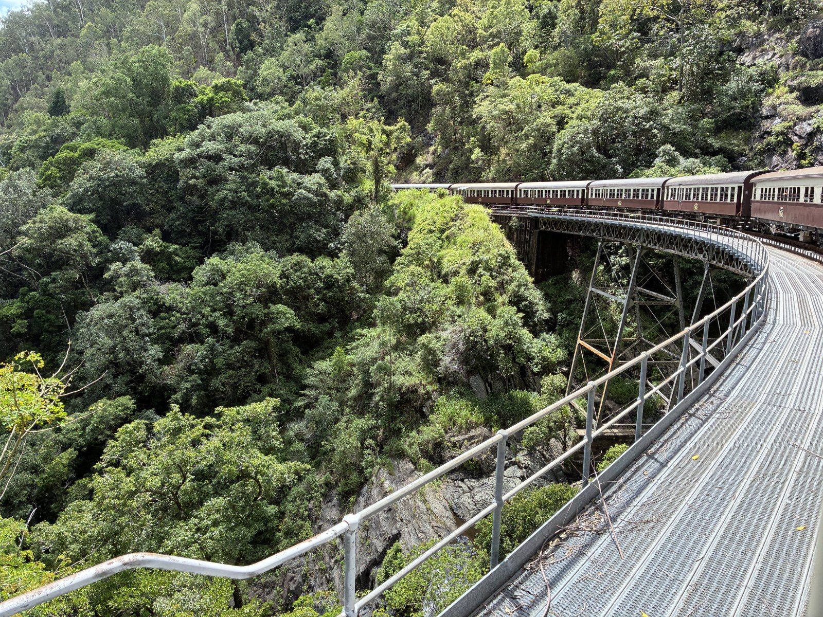 Kuranda Scenic Railway crossing the curved Stoney Creek trestle bridge