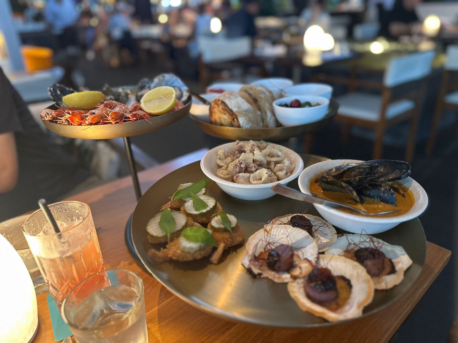 Tiered seafood platter with prawns, oysters, calamari and scallops at Salt House, Cairns