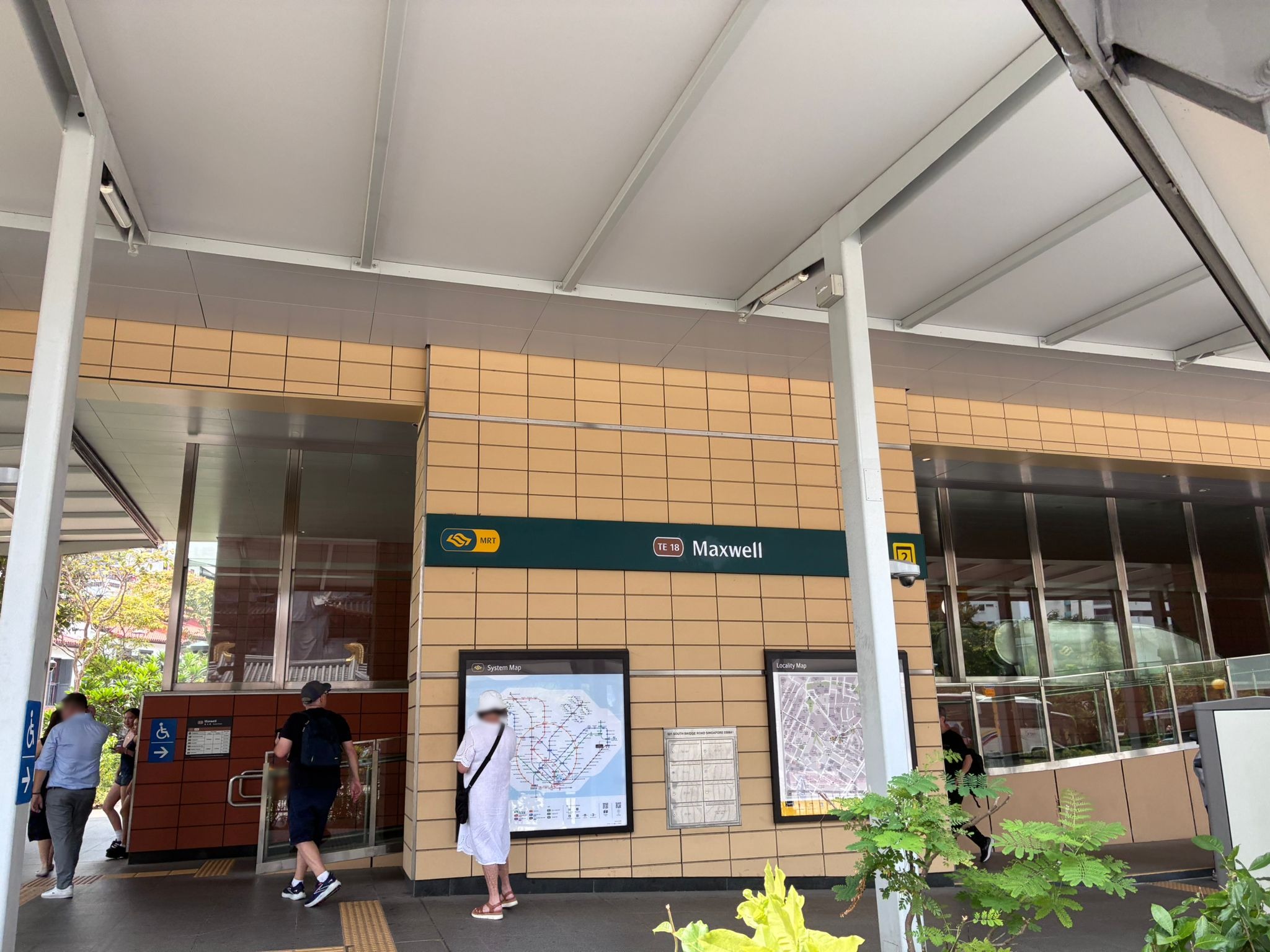 Exit of Maxwell MRT station (TE18) on the Thomson-East Coast Line, Chinatown Singapore (faces blurred)
