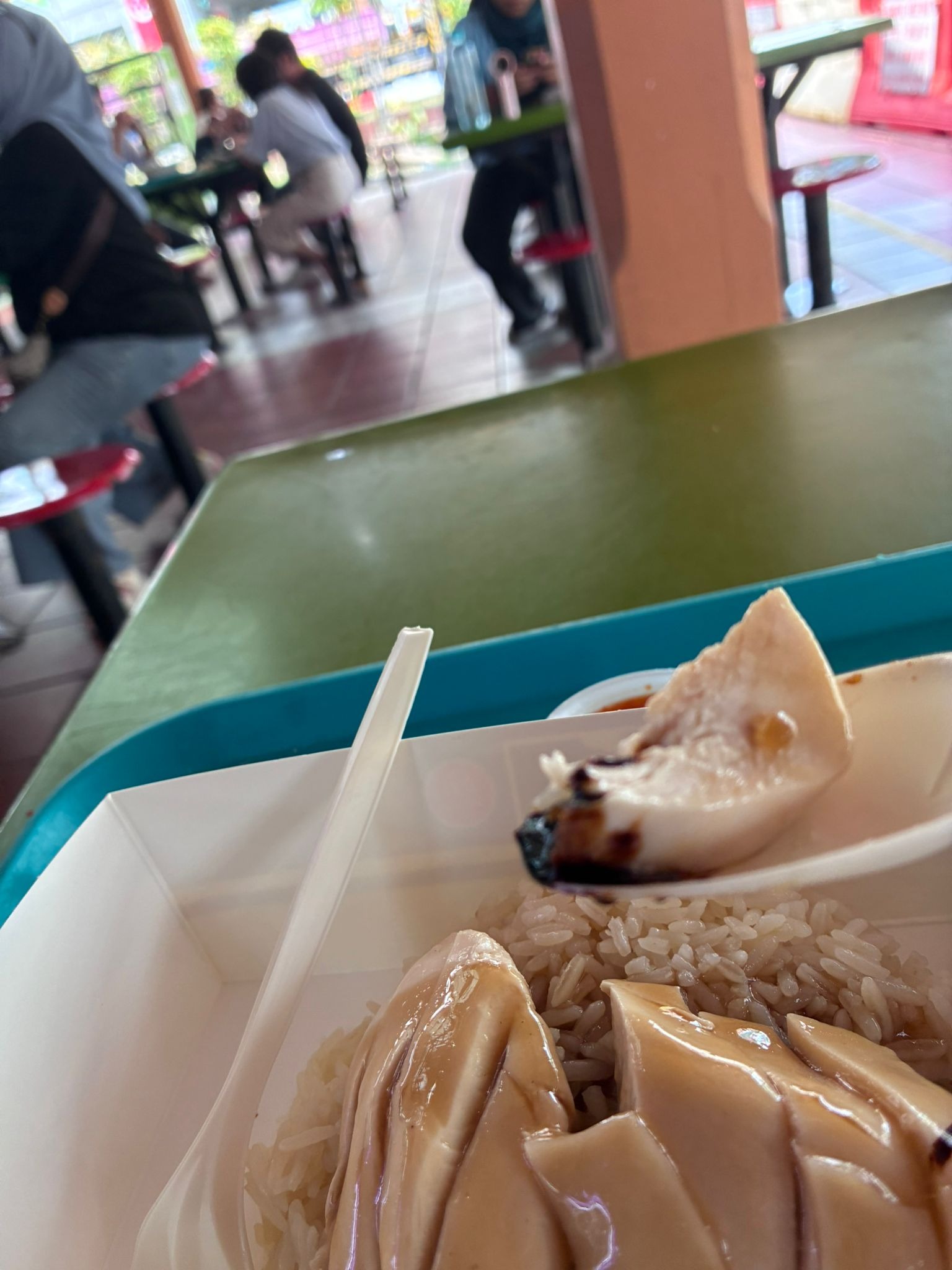 Chicken rice seen from a hawker centre seat at Maxwell Food Centre