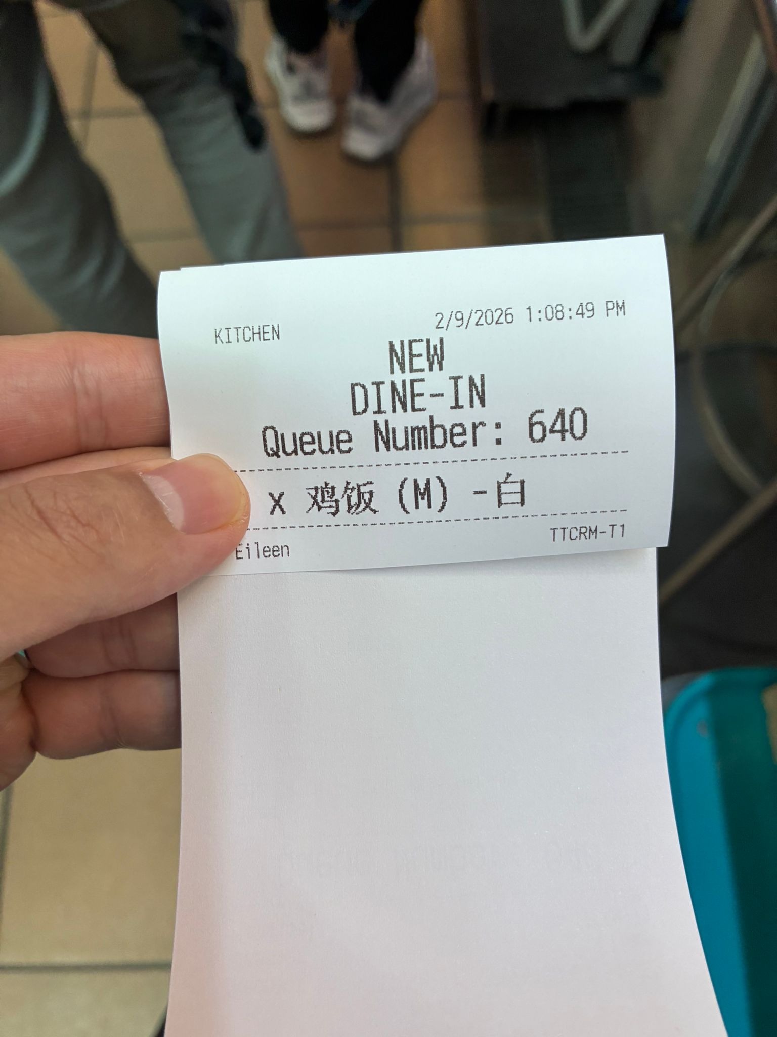 Queue number receipt from Tian Tian Hainanese Chicken Rice