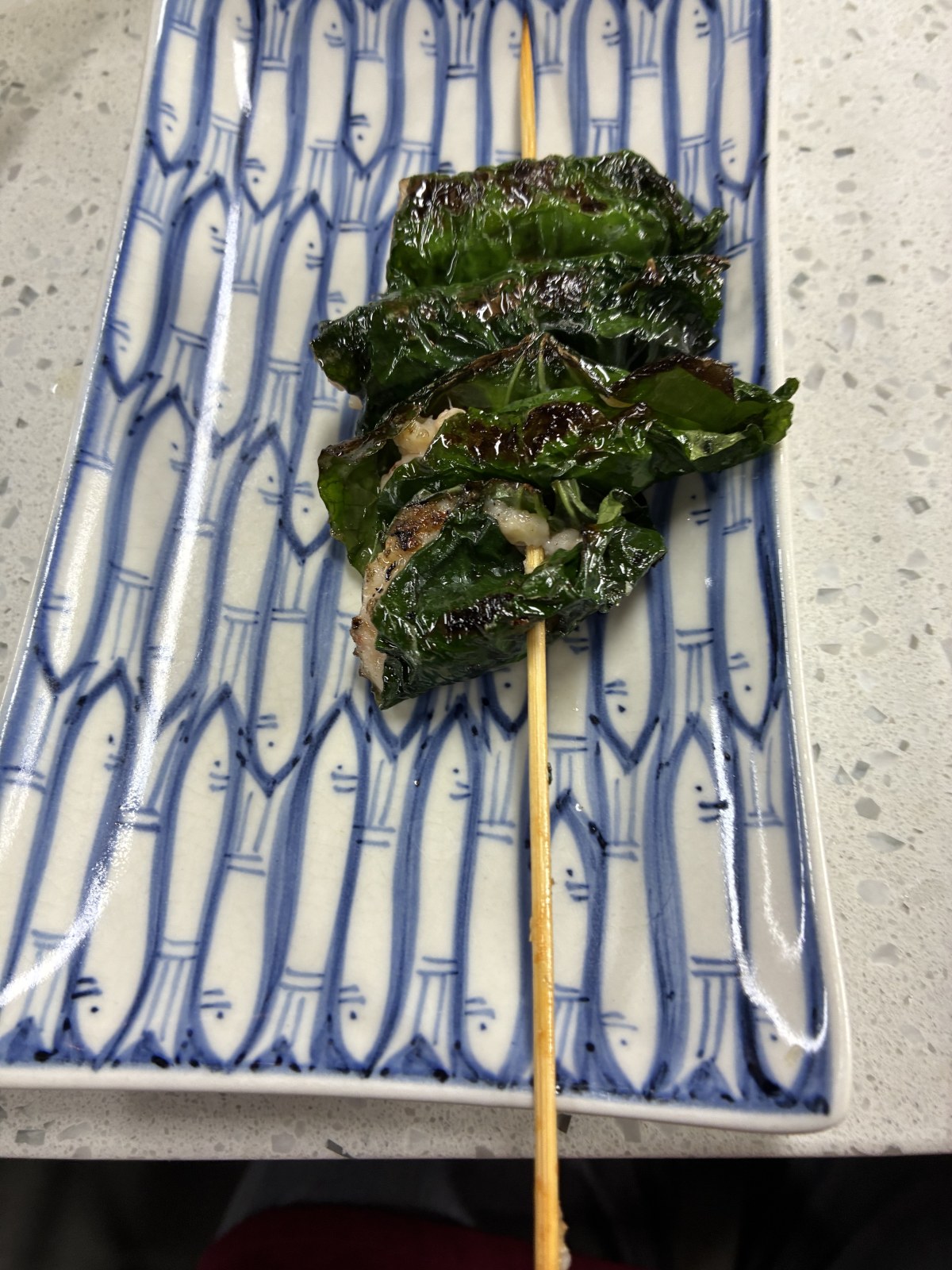 Bo la lot, grilled beef wrapped in betel leaf on a skewer, Vietnamese cooking class in Ho Chi Minh City