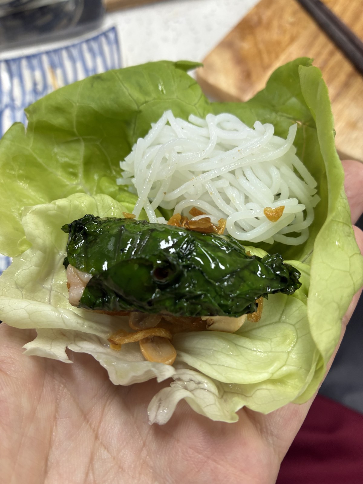 Bo la lot served in a lettuce leaf with rice vermicelli and fried shallots, Vietnam