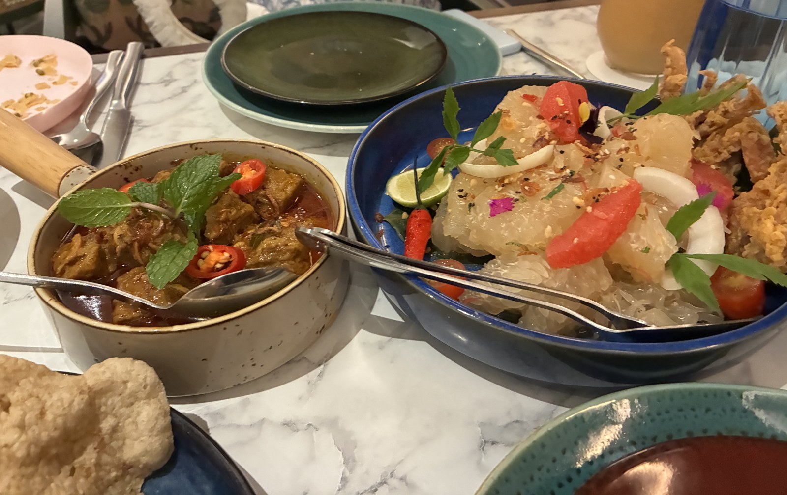Beef rendang with mint and a pomelo salad with chilli and herbs at De.Wan 1958, Kuala Lumpur