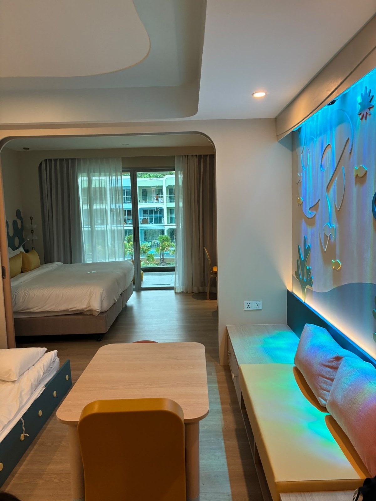 Family room in the Vhari Wing of Katathani Phuket Beach Resort with a kids area, Thailand