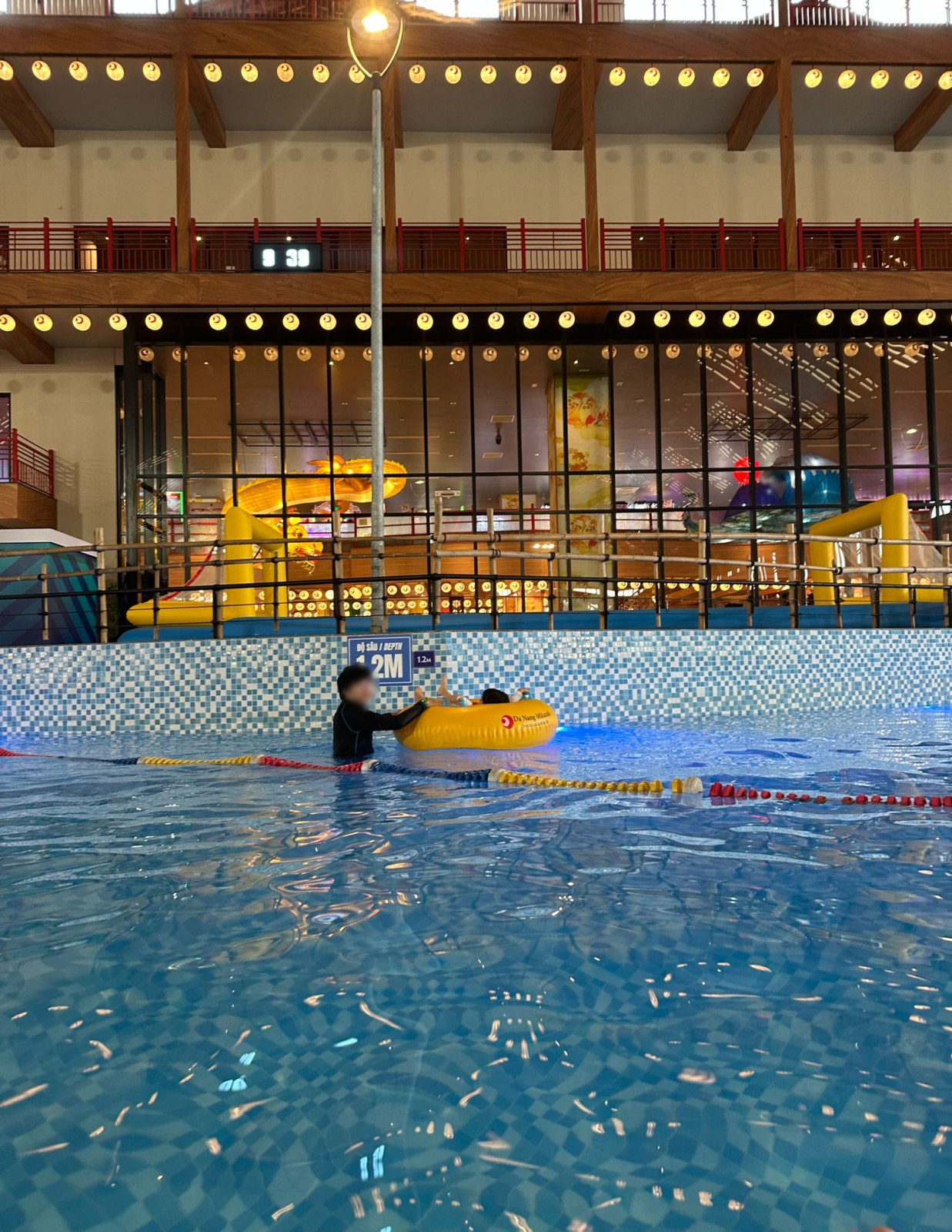 Indoor water park pool at Mikazuki Japanese Resorts and Spa Da Nang, Vietnam (faces blurred)