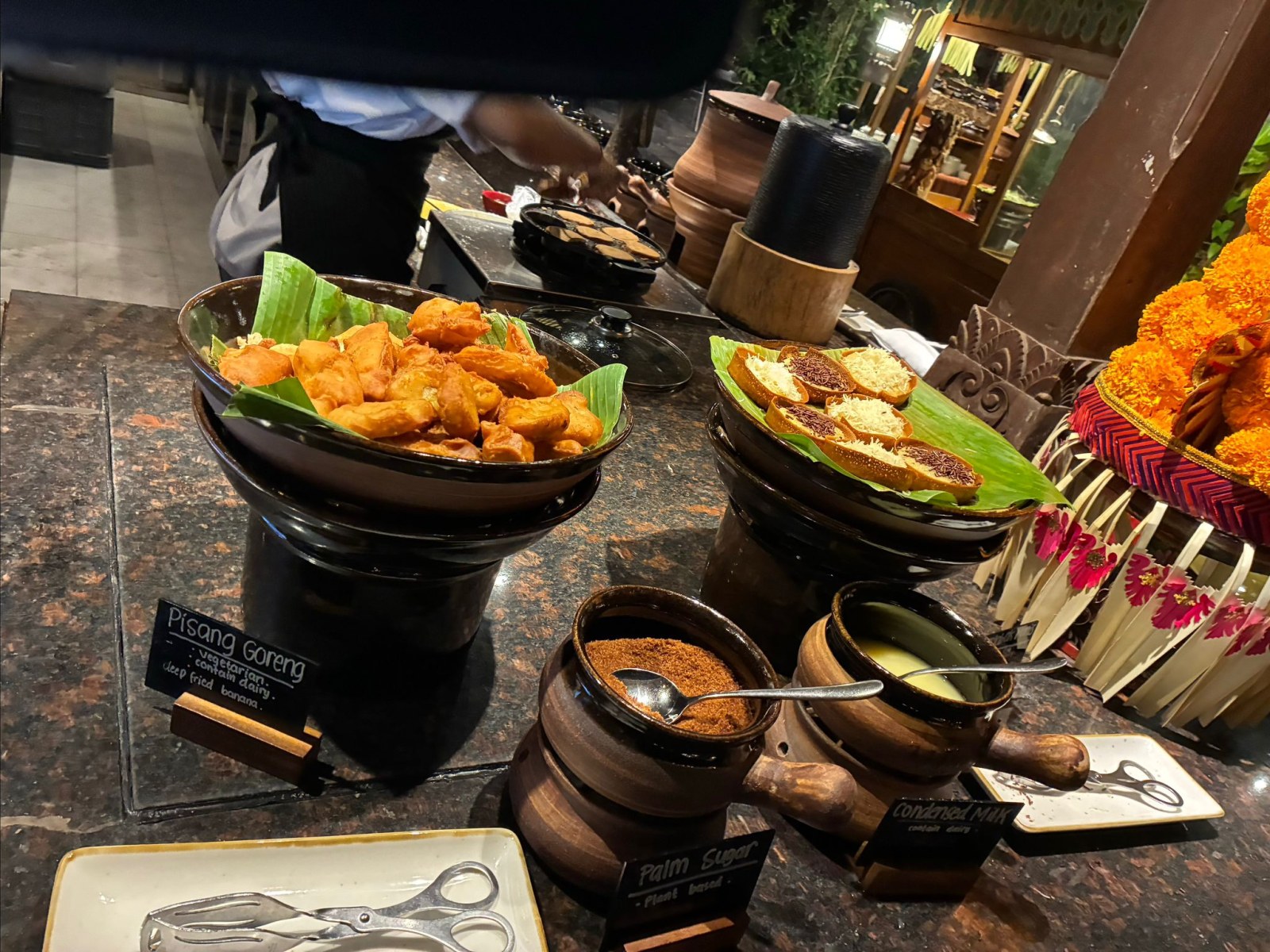 Dessert stall with pisang goreng, toast, palm sugar and condensed milk at Pasar Senggol, Grand Hyatt Bali