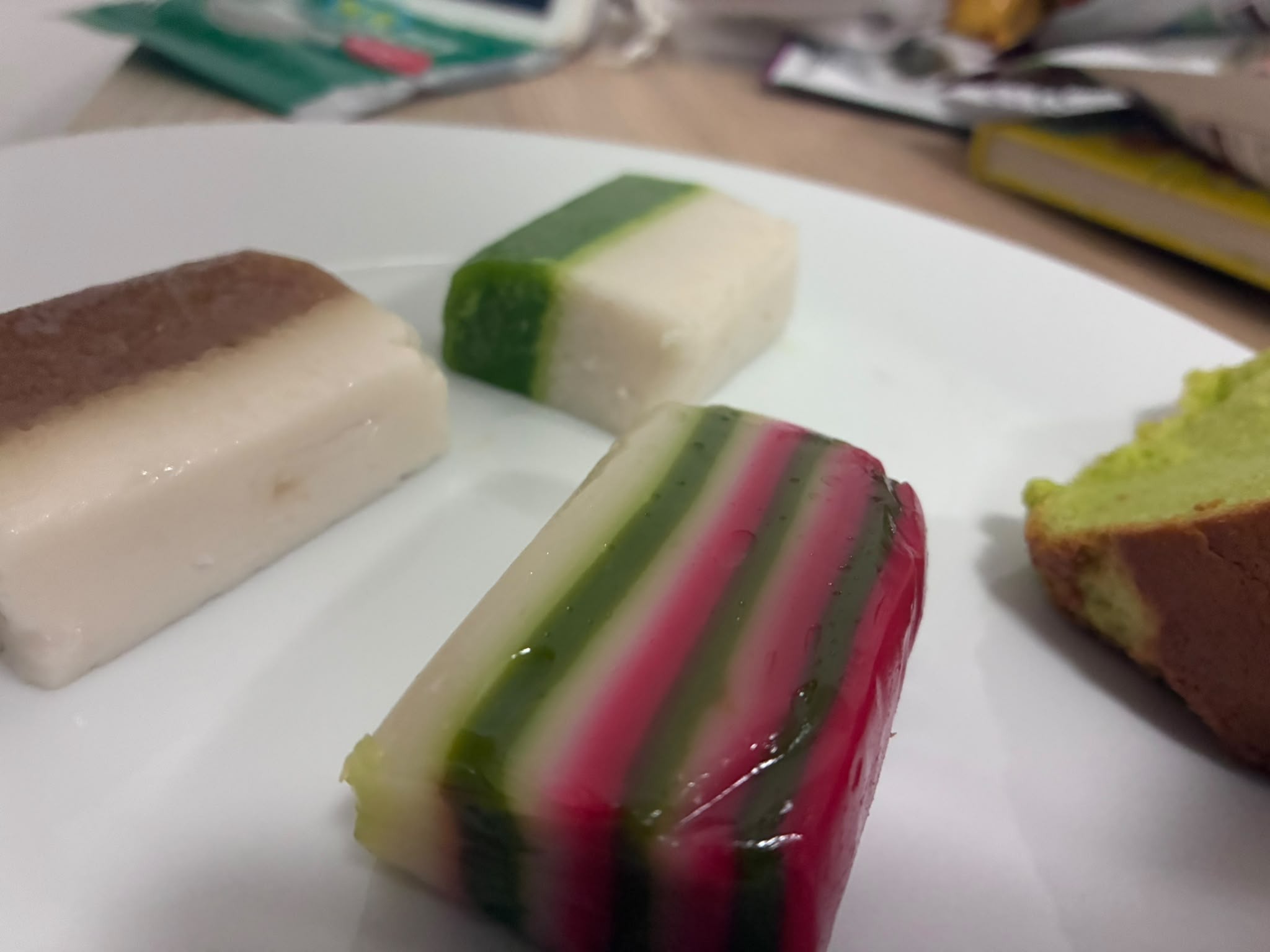 Close-up of rainbow kueh lapis and kueh talam from Bengawan Solo